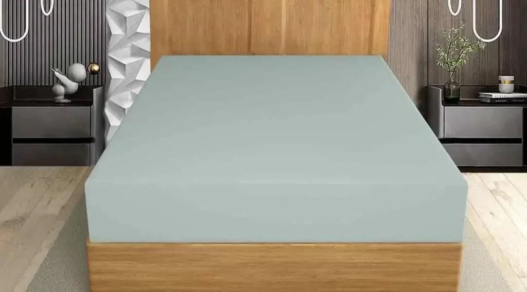 how to keep fitted sheet on bed